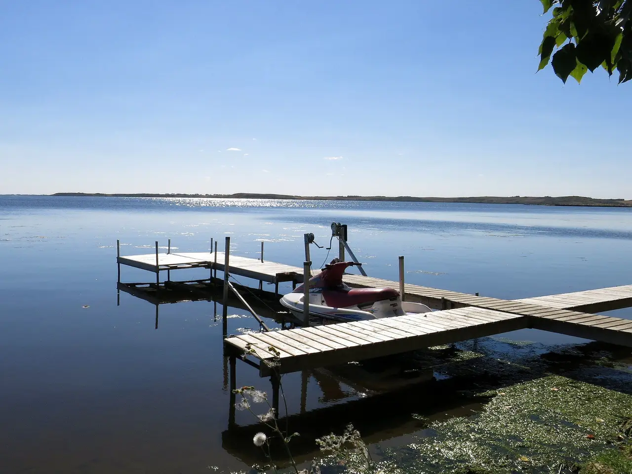 Dock and jet ski on Jackfish Lake, 2013